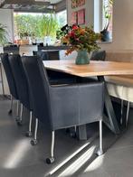 4 zwarte leren eetkamerstoelen (Dyyk) op wielen, Huis en Inrichting, Ophalen, Gebruikt, Zwart, Design