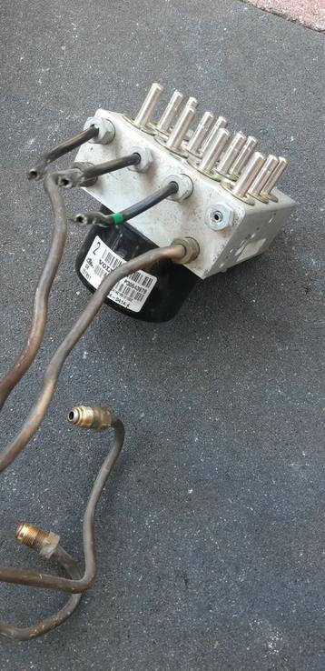 ABS pomp Volvo XC90 l onderdeelnummer P30643979 beschikbaar voor biedingen