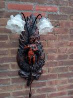 Barok engel lamp, Ophalen