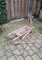 Oude houten Davos slee, Ophalen