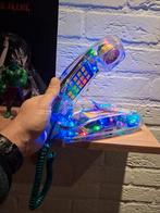 Transparante telefoon met lichtjes, Kunststof, Gebruikt, Futuristisch vintage, Ophalen of Verzenden