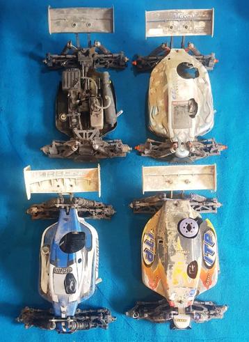 Lot van 4 Nitro buggy's 1/8 (Kyosho, RB, Storm) beschikbaar voor biedingen