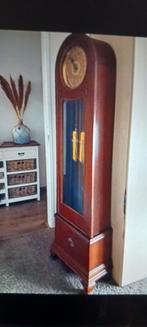 Staande klok, Ophalen