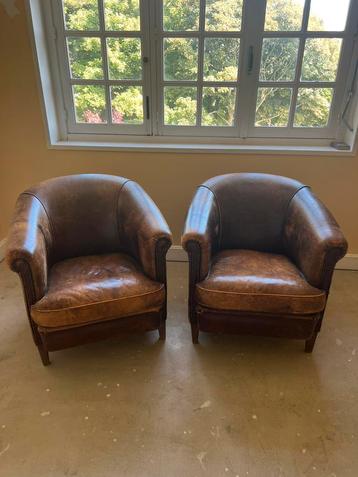 Vintage schapenleren clubfauteuils bruin-rood beschikbaar voor biedingen
