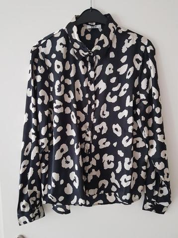 Mooie blouse met panterprint beschikbaar voor biedingen