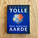 Een nieuwe aarde  -  Eckhart Tolle, Boeken, Spiritualiteit algemeen, Overige typen, Ophalen of Verzenden, Zo goed als nieuw