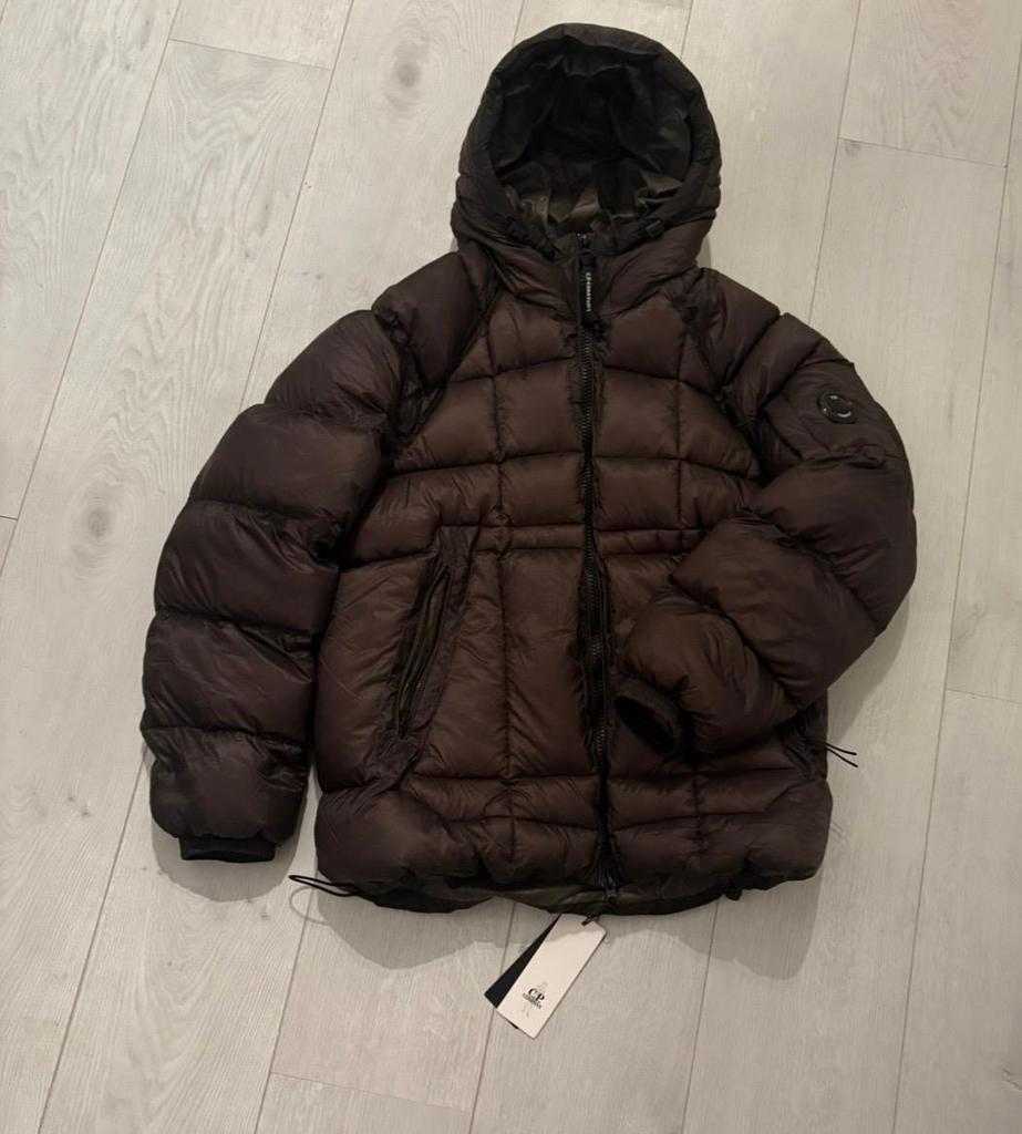 C.P. Company D.D. Shell donsjack met capuchon m nieuw, Kleding | Heren, Ophalen of Verzenden, Nieuw, Bruin