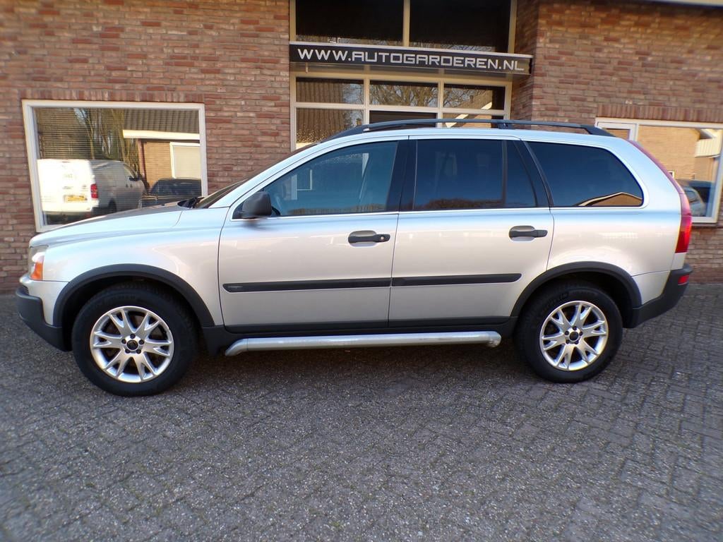 Volvo XC90 2.5 T Exclusive Automaat / Leder / Navi / 7 Perso, Auto's, Volvo, Gebruikt, Zwart, 7 stoelen, 2521 cc