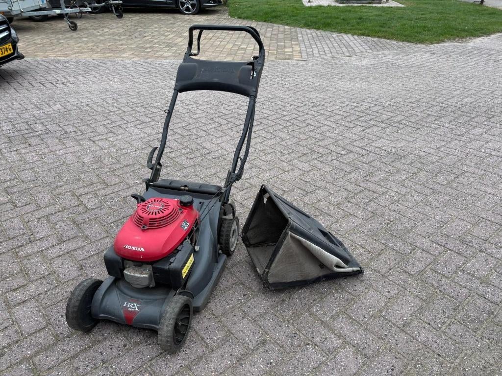 Honda HRX 420 benzine grasmaaier inclusief grasopvangbak., Ophalen, Cirkelmaaier, Honda, Gebruikt