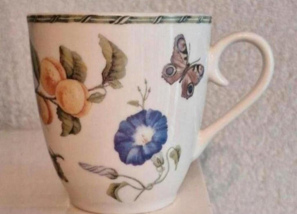 Beker Janneke Brinkman met opdruk Bloemen en Vlinders, Ophalen of Verzenden, Zo goed als nieuw, Overige stijlen, Kop(pen) en/of Schotel(s)