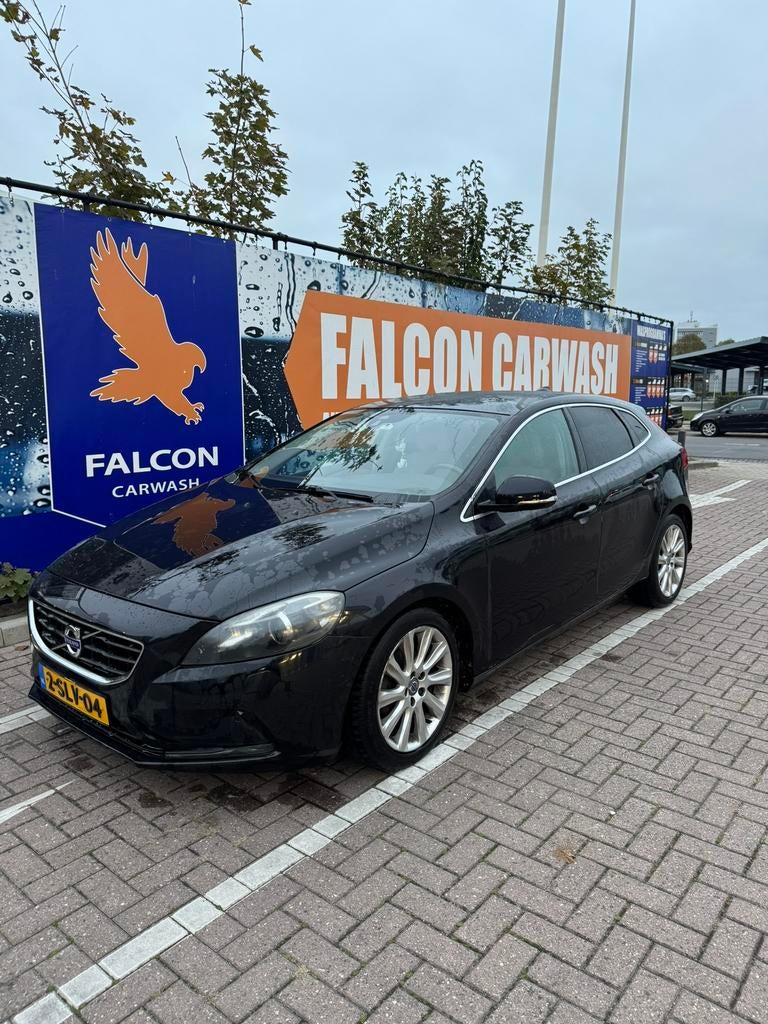 Volvo V40 1.6 D2 115PK 2013 Zwart, Auto's, Volvo, Voorwielaandrijving, Beige, 4 cilinders, Zwart