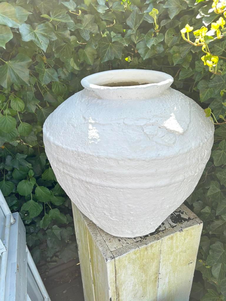 Oude pot waterkruik, Ophalen