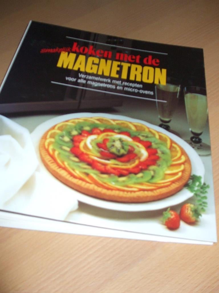 Te koop map "Koken met de magnetron".(nieuw)., Boeken, Ophalen of Verzenden, Nieuw