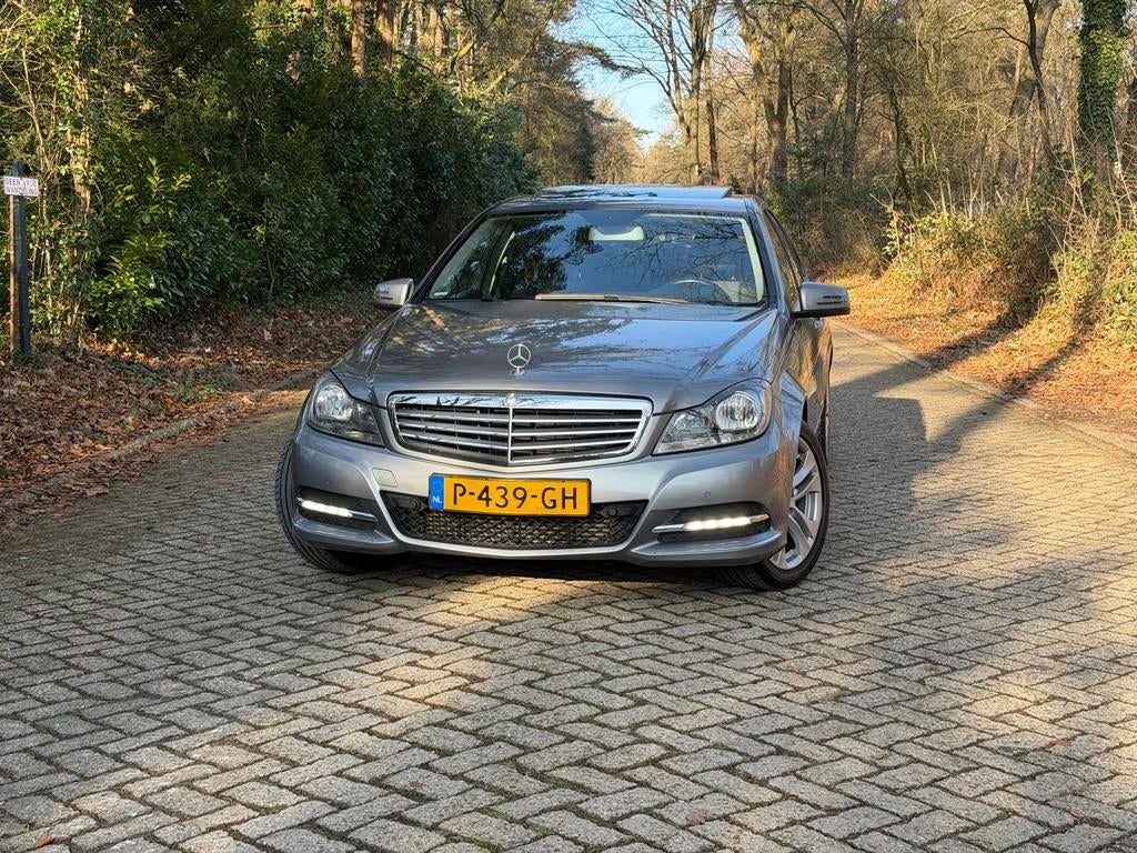 Mercedes-Benz C180 1.6 Sedan AUT 2013 Grijs, Achterwielaandrijving, 1800 kg, Leder en Stof, 1595 cc
