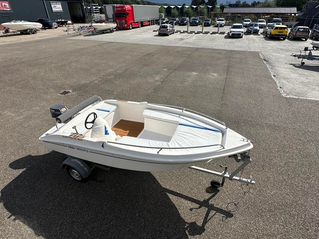 Zeer nette consoleboot compleet met motor en trailer, Watersport en Boten, Gebruikt, Tot 10 pk, Ophalen of Verzenden, 3 tot 6 meter
