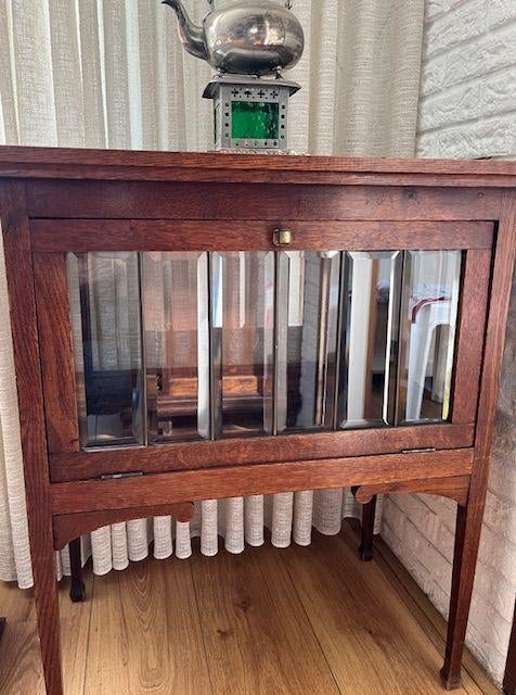 Antieke theetafel, Ophalen