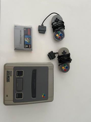 Super Nintendo met 2 controllers beschikbaar voor biedingen