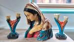 Maria borstbeeld met kandelaars, Ophalen