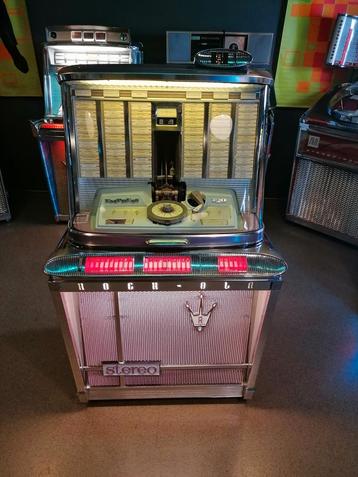 Te koop zeer mooie gerestaureerde Rock-ola Empress jukebox beschikbaar voor biedingen