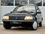 Peugeot 205 1.6 New Look Aut. | 117.000 km | Schuifdak, Auto's, Peugeot, Zwart, Bedrijf, Radio, Grijs