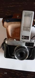 Olympus Trip 35 met flitser en beschermhoes., Ophalen of Verzenden, Gebruikt, Compact, Olympus
