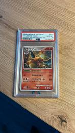 PSA 10 Charizard Holo - Advent of Arceus 1st Ed., Ophalen of Verzenden, Zo goed als nieuw, Losse kaart, Foil