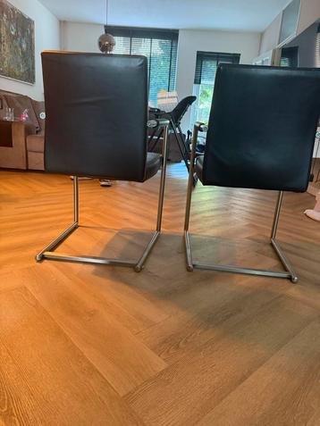 2 Zwarte Leren Eetkamerstoelen