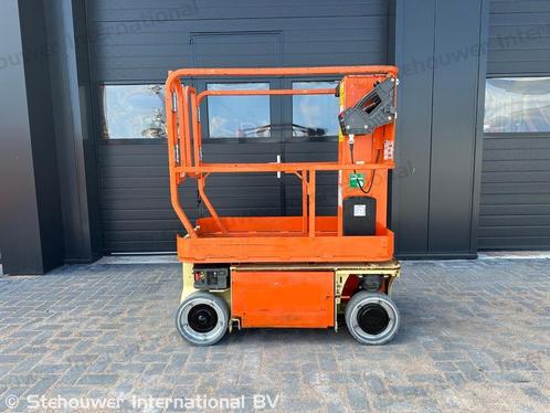 JLG 1230ES masthoogwerker 1230 ES mast hoogwerker, Zakelijke goederen, Machines en Bouw | Liften, Steigers en Ladders