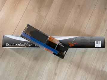 Laminaatsnijder en legset beschikbaar voor biedingen