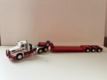 Volvo NL12 met dieplader van Conrad beschikbaar voor biedingen