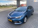 Toyota Auris Touring Sports 1.8 Hybrid Lease pro, Auto's, Gebruikt, Euro 6, Blauw, Leder en Stof