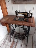 Oude Singer trapnaaimachine, Ophalen