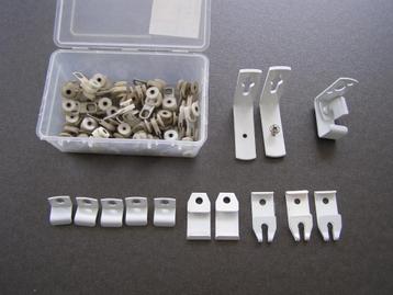 Diverse onderdelen tbv gordijnrails: lopers, beugels etc  beschikbaar voor biedingen