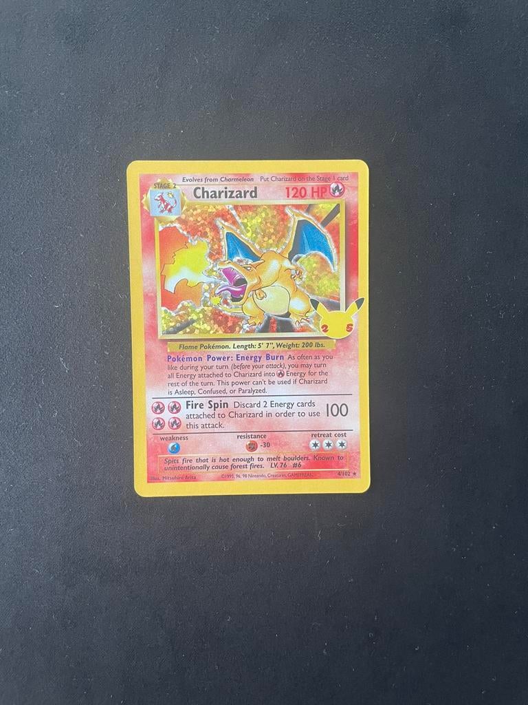 Celebrations charizard MINT, Ophalen of Verzenden, Nieuw, Losse kaart, Foil