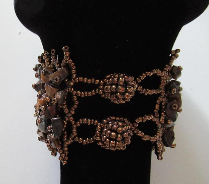 Armbanden Bruine kralen met hout., Sieraden, Tassen en Uiterlijk, Armbanden, Nieuw, Elastiek, Bruin, Met bedels of kralen, Ophalen