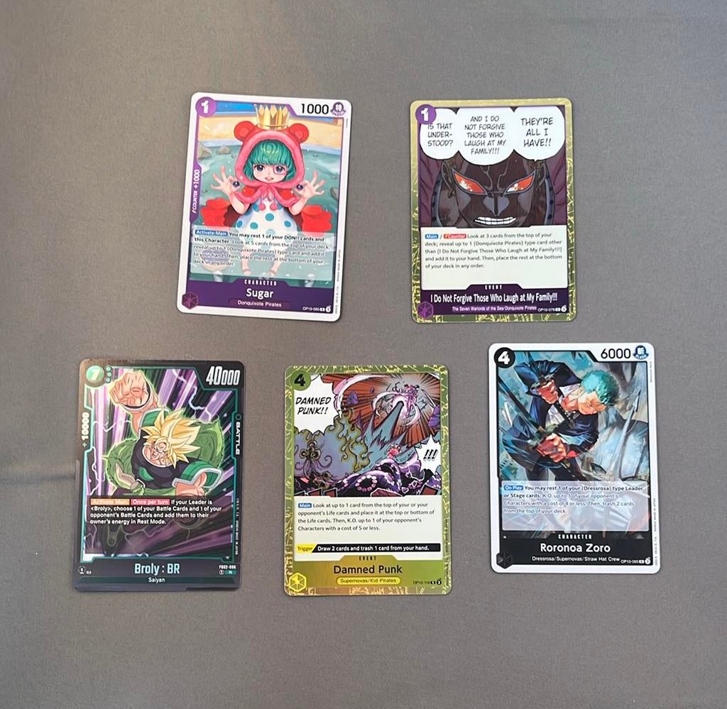 4 One Piece kaarten + Dragon Ball Super kaart, Ophalen of Verzenden, Zo goed als nieuw, Meerdere kaarten