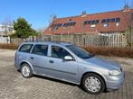 Opel Astra 1.6 16V station wagon 2002 Grijs, Auto's, 47 €/maand, Origineel Nederlands, Te koop, Zilver of Grijs