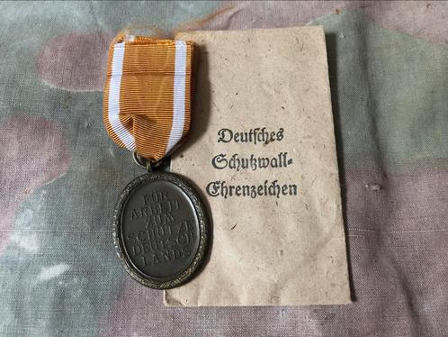 WW2 Schutzwall medaille+zakje, Verzamelen, Militaria | Tweede Wereldoorlog, Landmacht, Lintje, Medaille of Wings, Duitsland, Ophalen of Verzenden