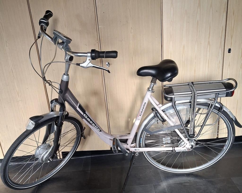 Nette electrische damesfiets, Ophalen, Zo goed als nieuw, 51 tot 55 cm, 50 km per accu of meer