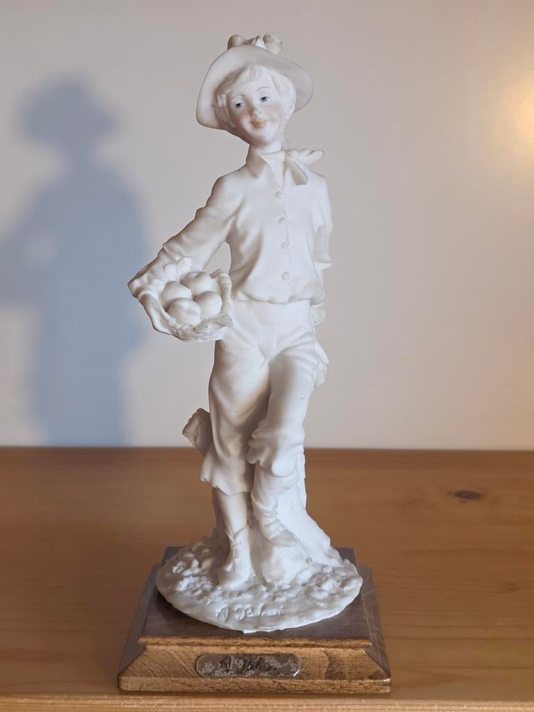 A. Belcari beeldje Jongen met fruitmand, Ophalen of Verzenden