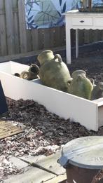 Kast met kruiken, Ophalen