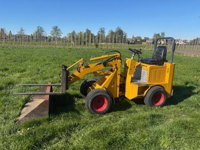 Knikmops 100 mini shovel te koop., Ophalen, Wiellader of Shovel