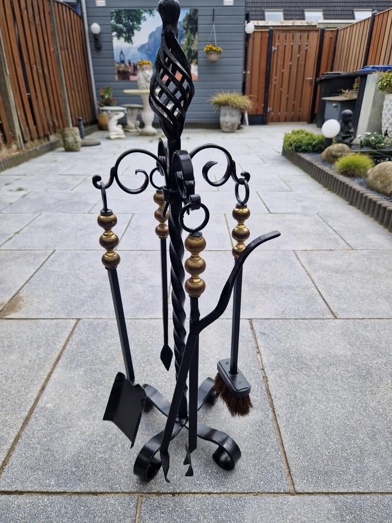 Openhaard set smeedijzer, Ophalen