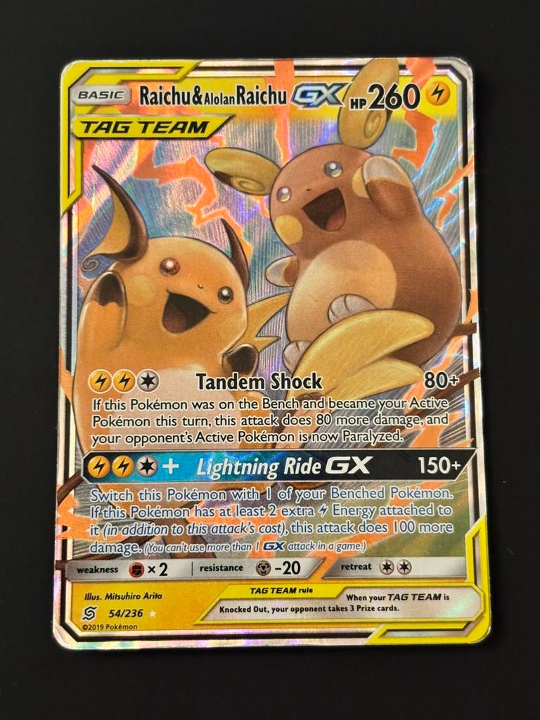 Raichu & Alolan Raichu GX - Unified Minds 54/236, Hobby en Vrije tijd, Verzamelkaartspellen | Pokémon, Ophalen of Verzenden, Zo goed als nieuw