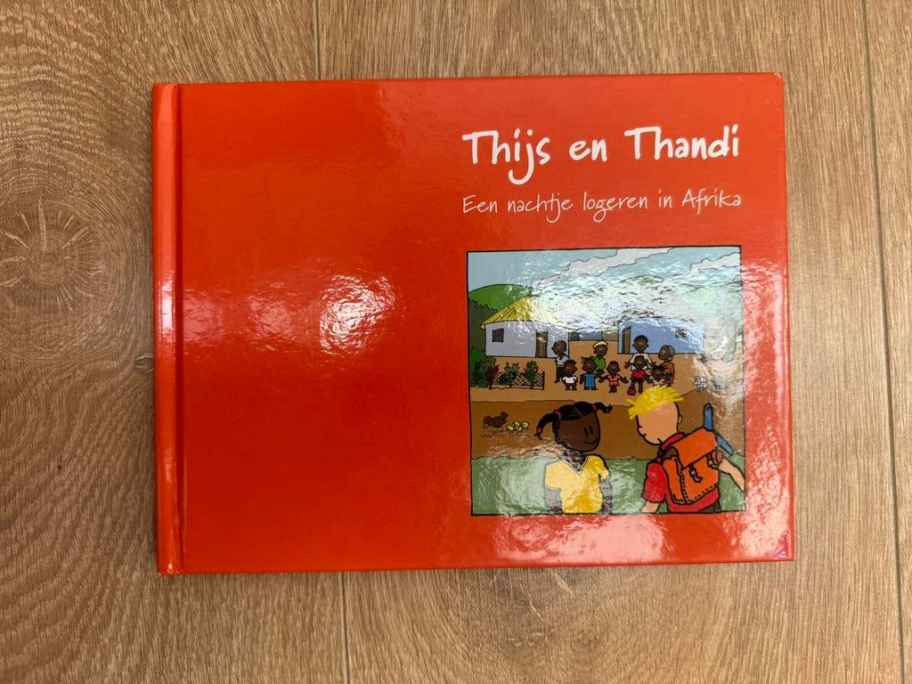 Boek Thijs en Thandi - een nachtje logeren in Afrika, Ophalen of Verzenden, Gelezen