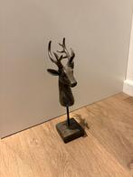 Woonaccesoires hertenkop, Ophalen