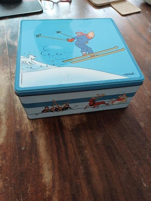 Blik van Kuifje met ski's - leuk item - blik is wel leeg, Verzamelen, Stripfiguren, Gebruikt, Beeldje of Figuurtje, Kuifje, Ophalen of Verzenden