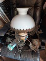 Grote Petroleumlamp met kaarsenstandaards, Ophalen