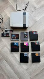 Nintendo NES met 7 games, 2 controllers en Zapper, Ophalen of Verzenden, Zo goed als nieuw, Met 2 controllers, Met games