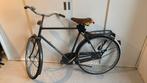 Oude herenfiets, Ophalen